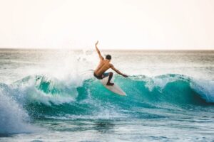 surfing in uluwatu