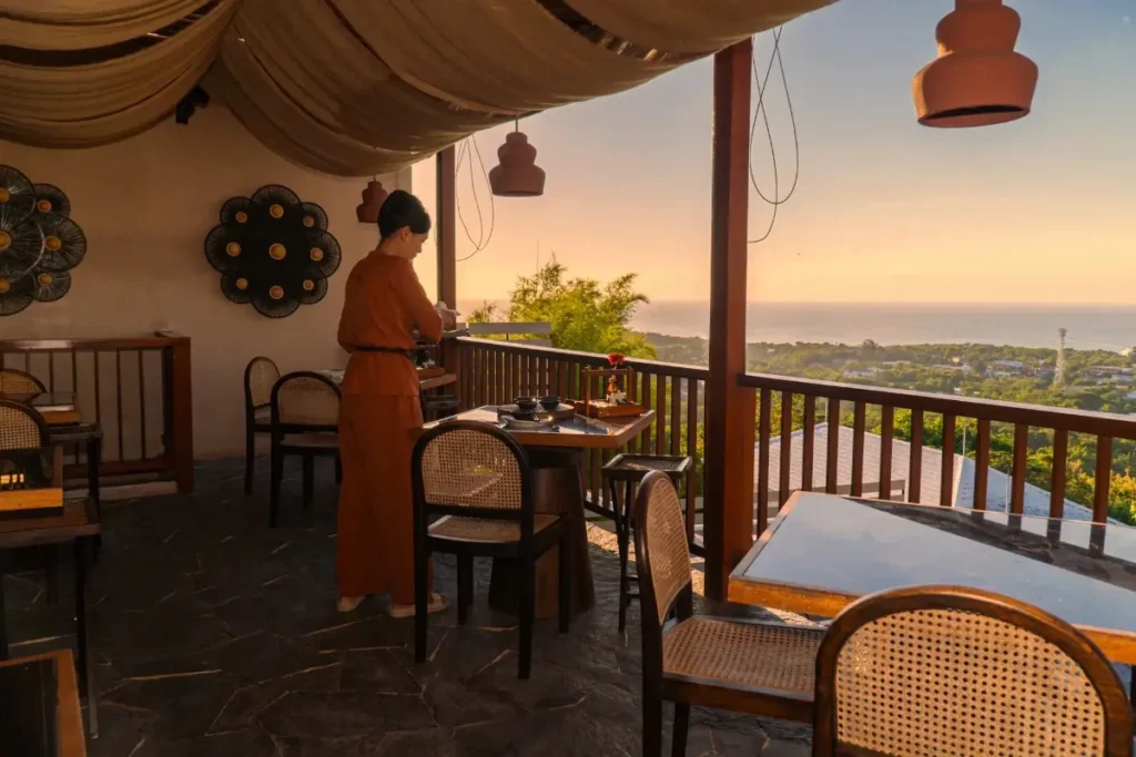 Restaurant with ocean sunset view for a dinner experience in Bali.