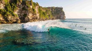 surfing in uluwatu